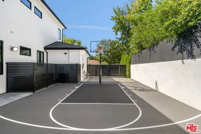 a view of a mini pool with a yard