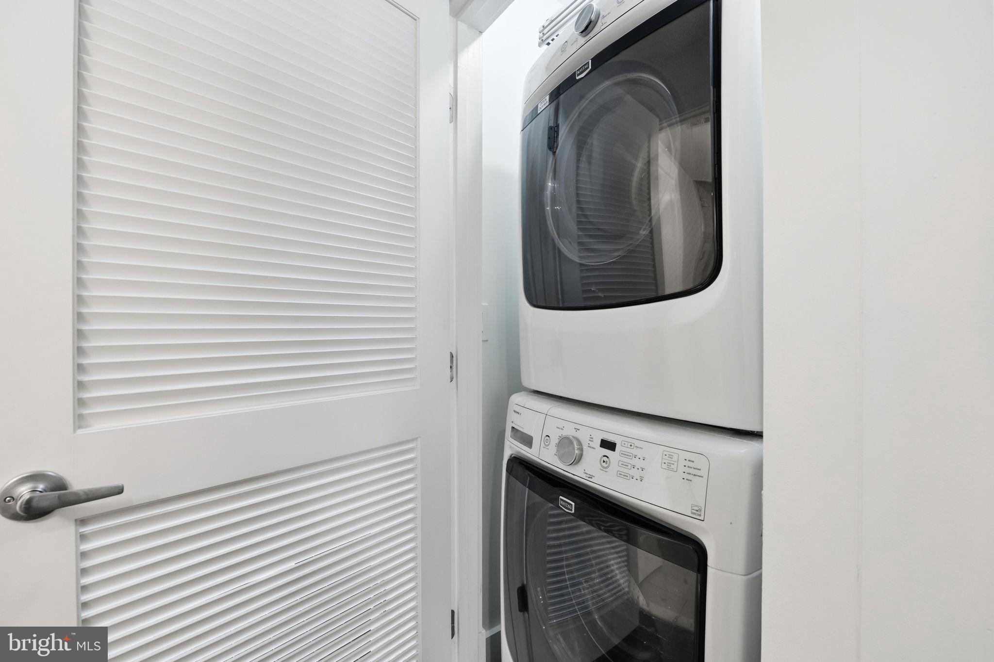 26 Q Street Northeast, Unit 1 Washington, DC 20002 - Photo 19 of 36 a close up view of a washer and dryer