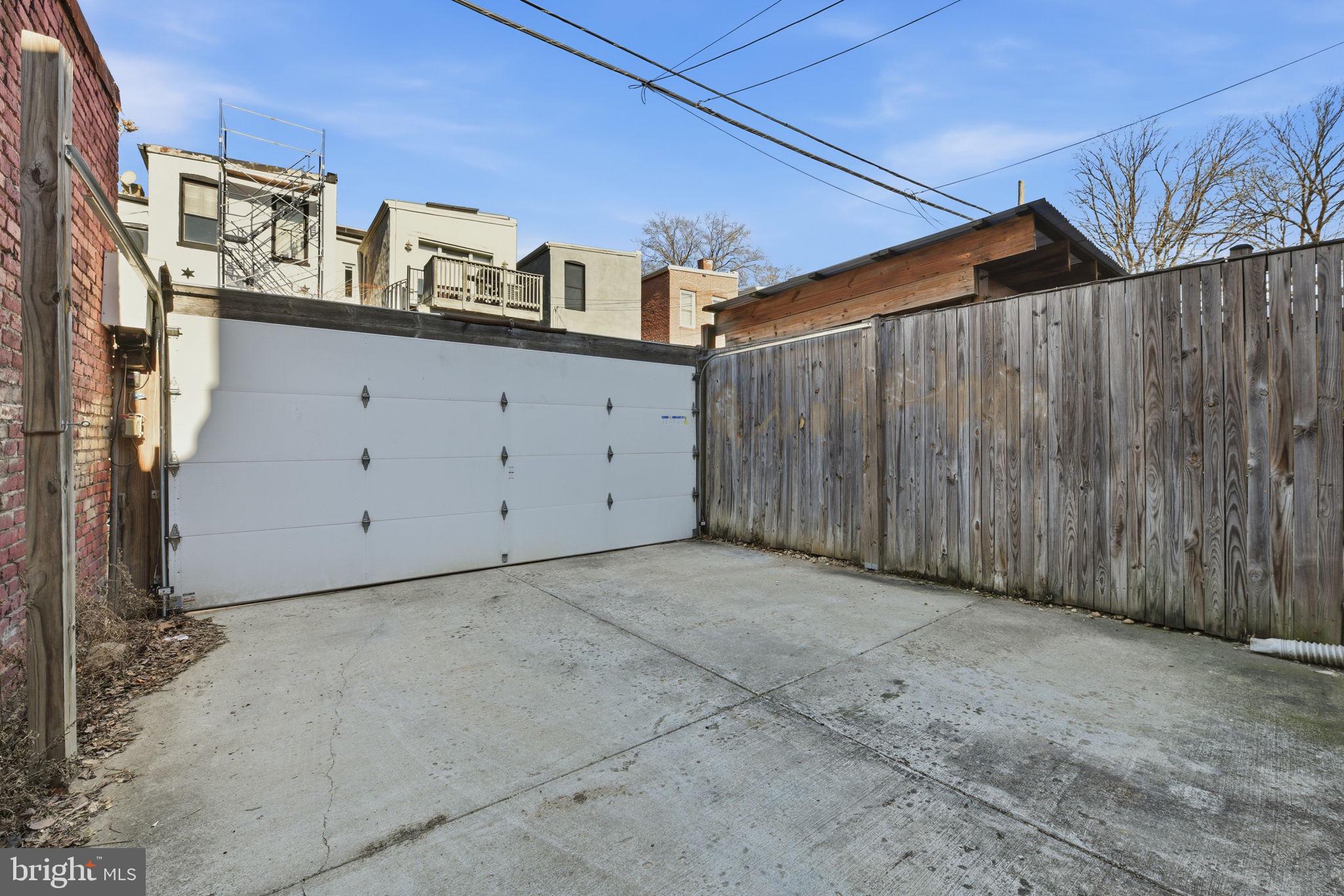 26 Q Street Northeast, Unit 1 Washington, DC 20002 - Photo 31 of 36 a view of a utility room with cabinet