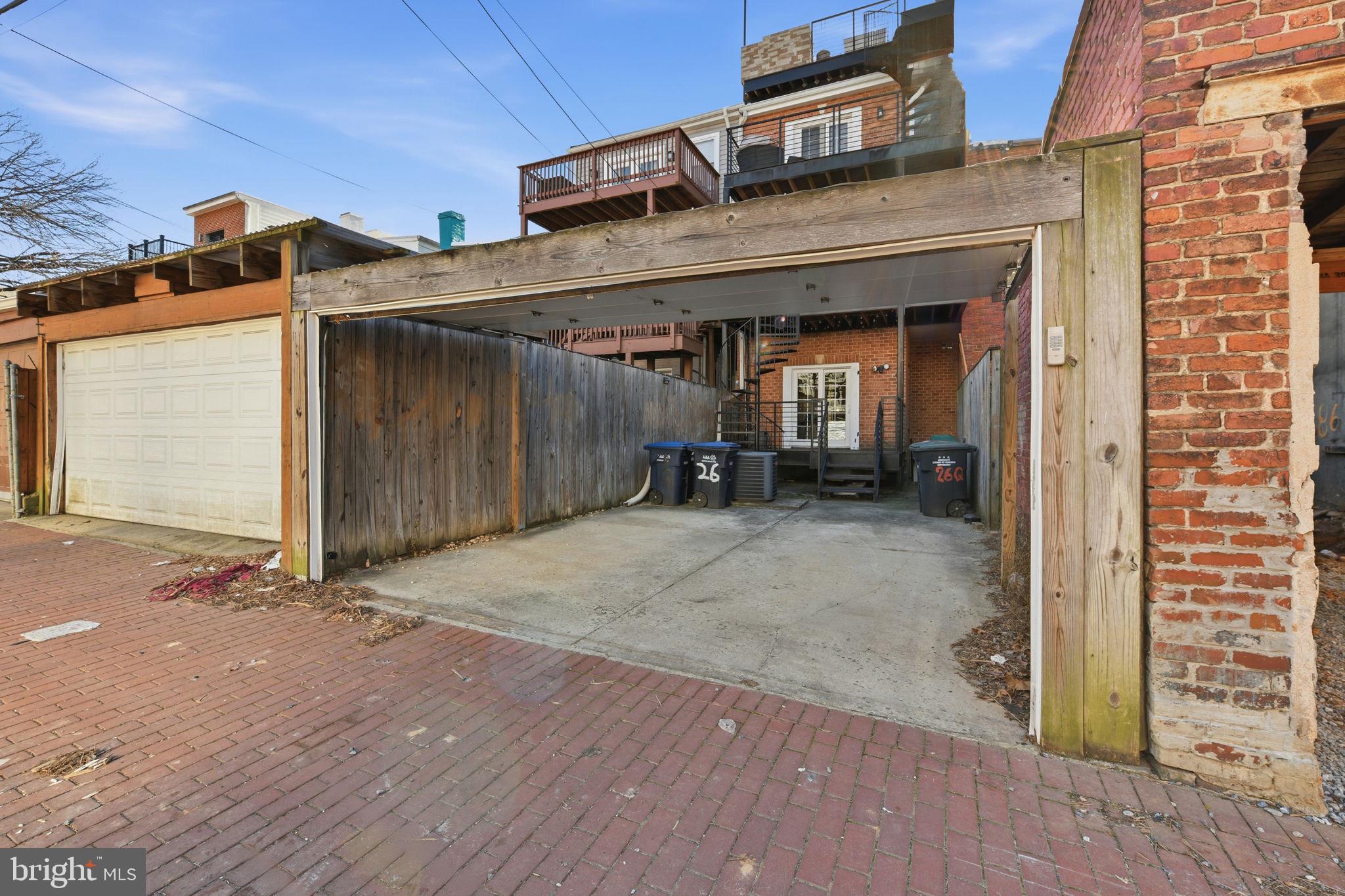 26 Q Street Northeast, Unit 1 Washington, DC 20002 - Photo 32 of 36 a view of a car garage of the house