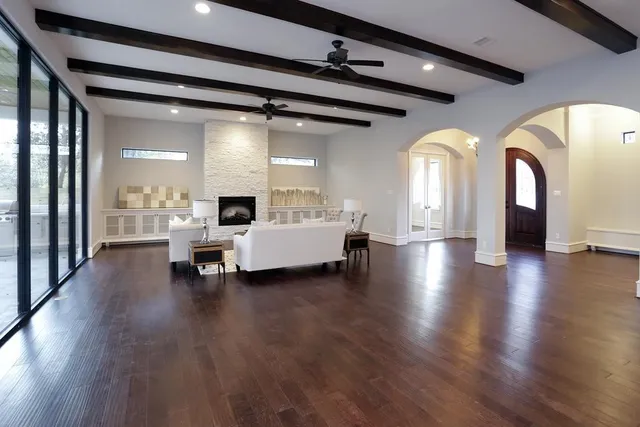 a living room with couches and a fireplace