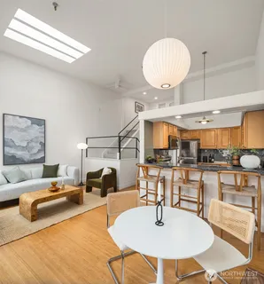 a living room with furniture and a table