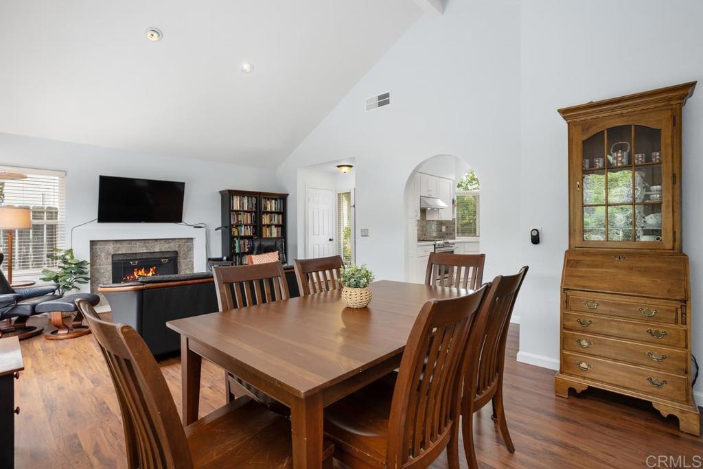 2075 Paseo De Anza Vista, CA 92084 - Photo 11 of 51 a view of a dining room with furniture window and wooden floor