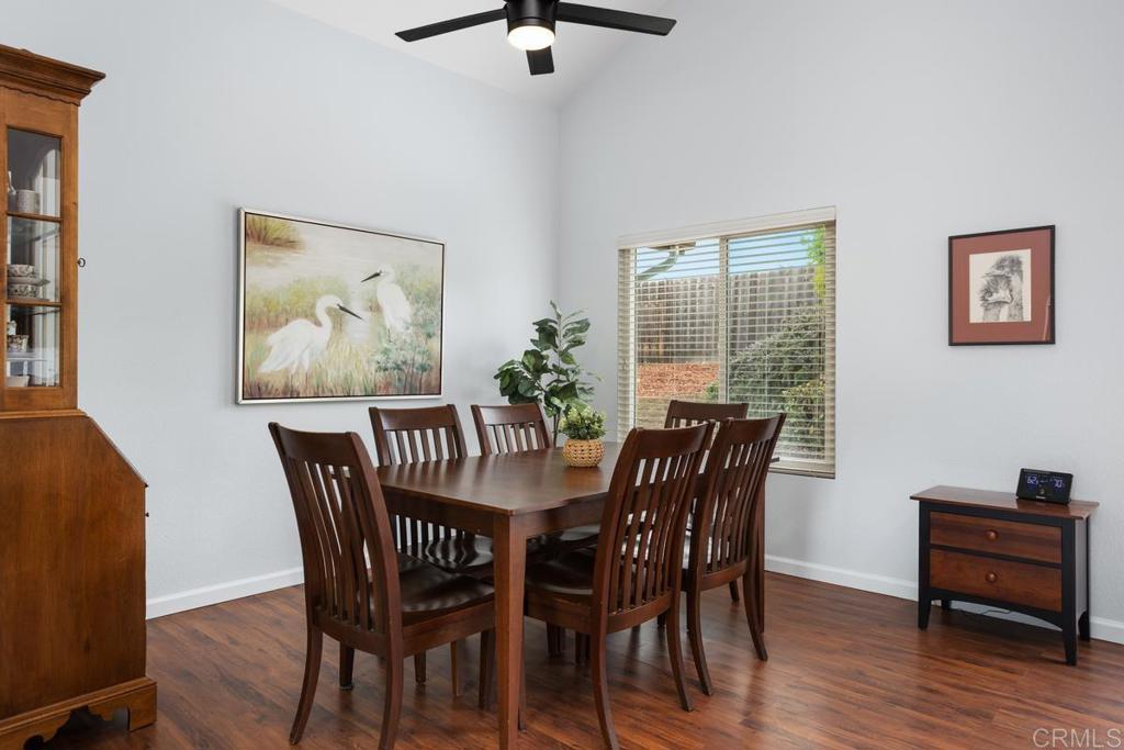 2075 Paseo De Anza Vista, CA 92084 - Photo 12 of 51 a view of a dining room with furniture window and wooden floor