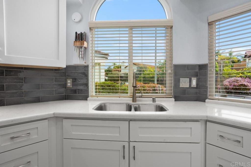 2075 Paseo De Anza Vista, CA 92084 - Photo 18 of 51 a kitchen with a sink and a window