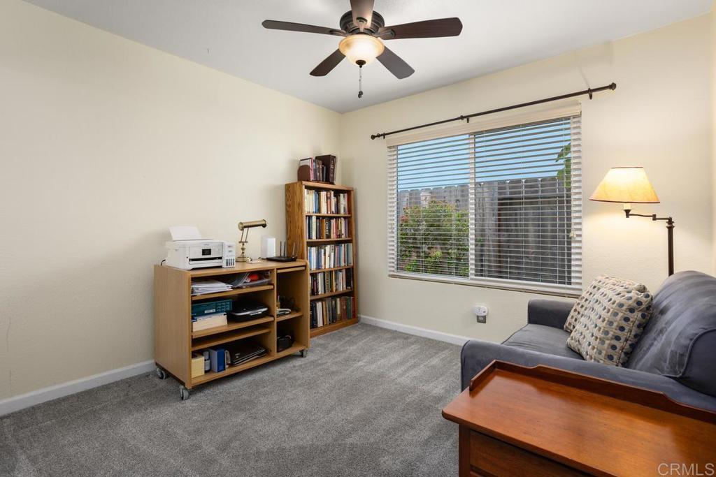 2075 Paseo De Anza Vista, CA 92084 - Photo 22 of 51 a bedroom with furniture and a window