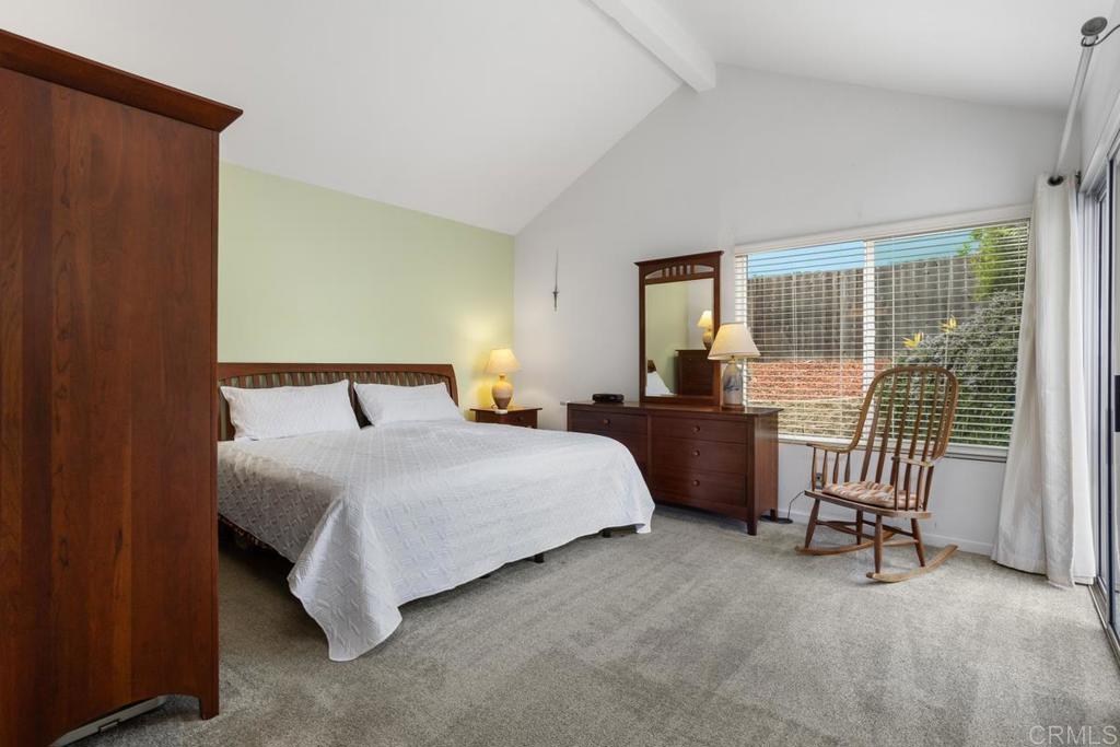 2075 Paseo De Anza Vista, CA 92084 - Photo 23 of 51 a bedroom with a bed chair and a large window
