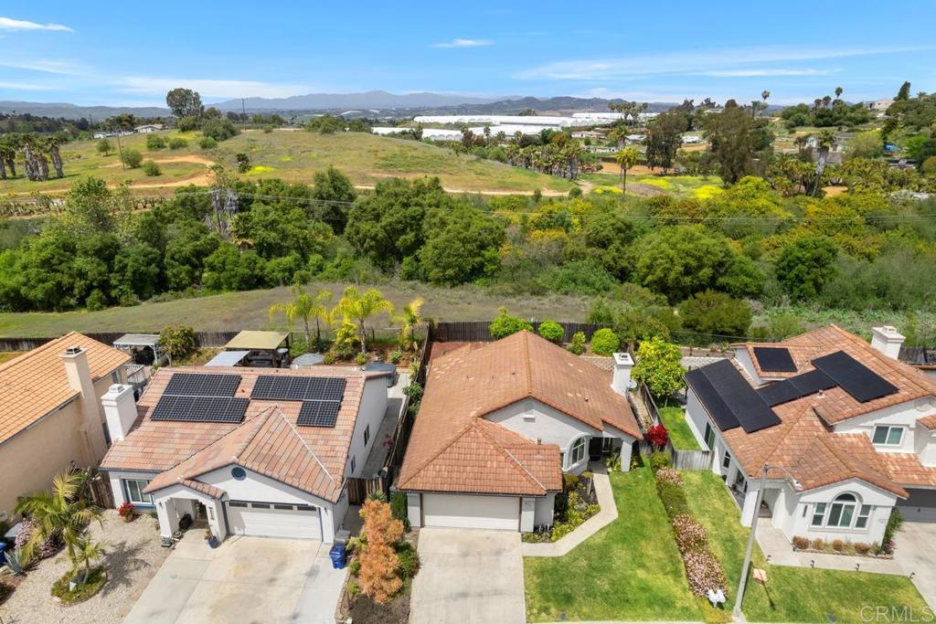 2075 Paseo De Anza Vista, CA 92084 - Photo 35 of 51 an aerial view of residential houses with outdoor space and ocean view
