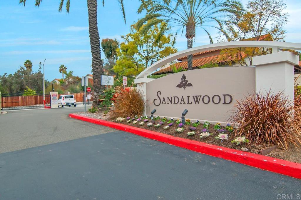 2075 Paseo De Anza Vista, CA 92084 - Photo 40 of 51 a sign on the side of a building