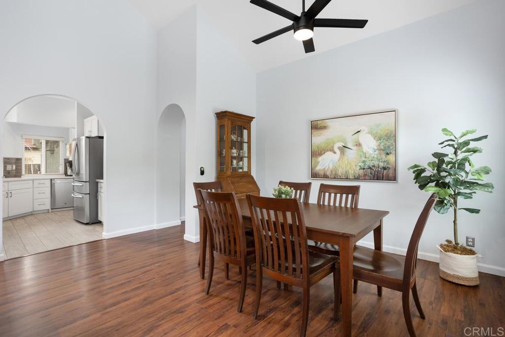 2075 Paseo De Anza Vista, CA 92084 - Photo 10 of 51 a view of a dining room with furniture and wooden floor