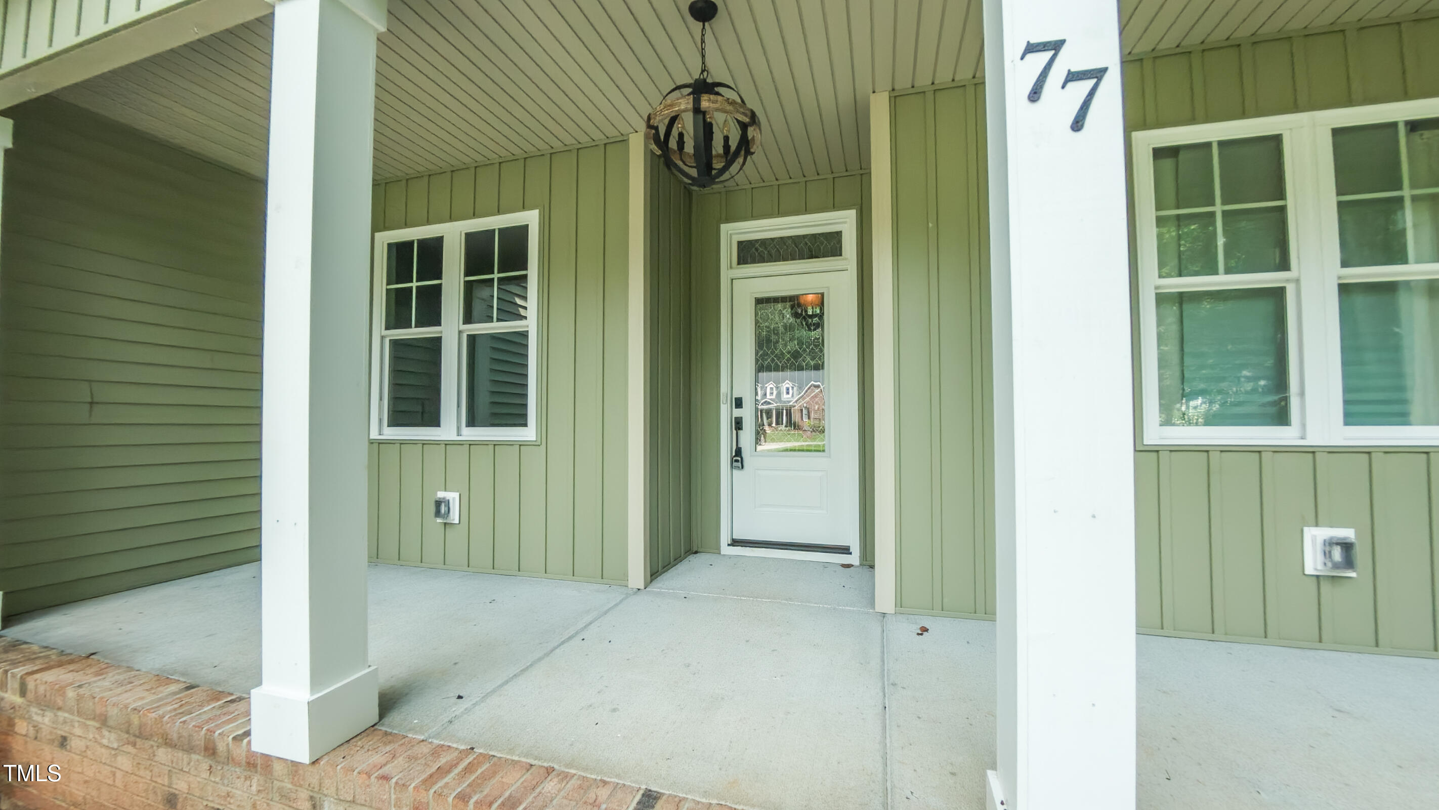 77 Running Deer Path Timberlake, NC 27583 - Photo 9 of 41 a view of front door of a house