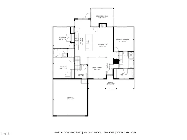 a living room with furniture a flat screen tv and a lamp