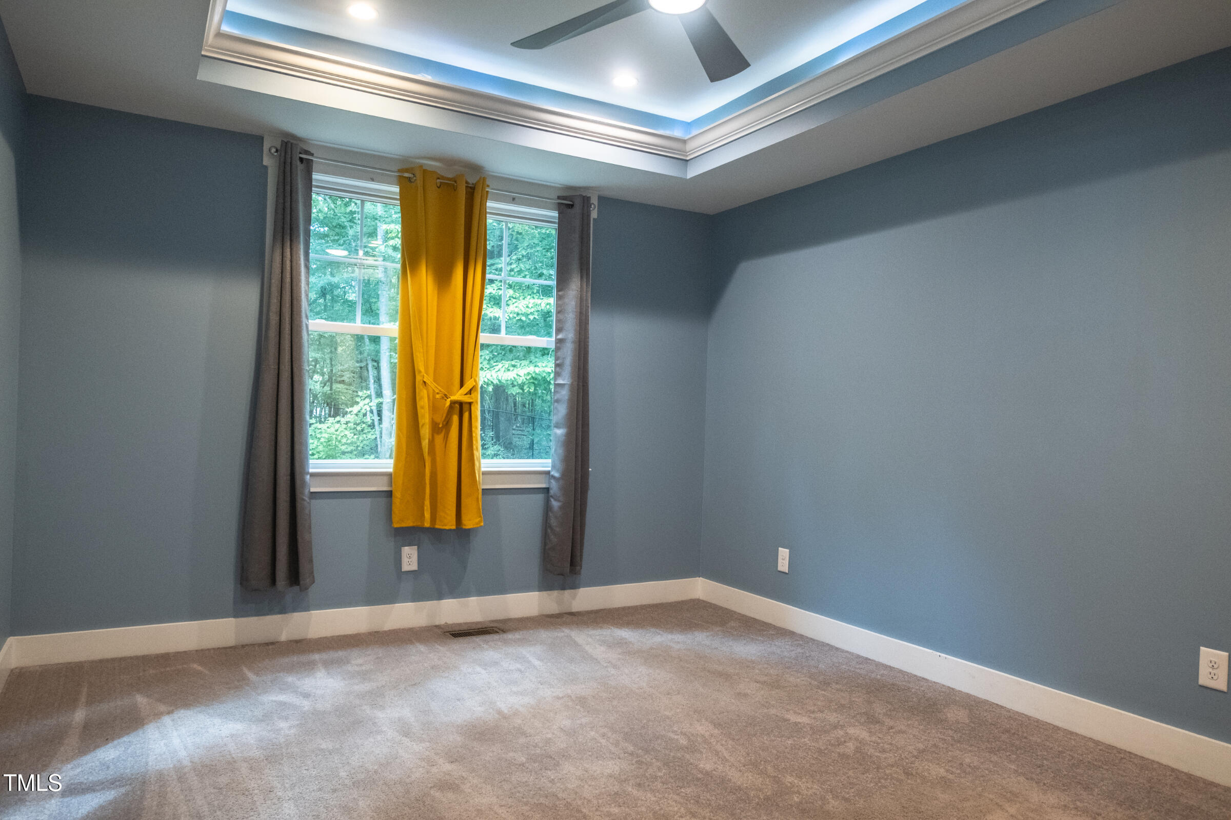 77 Running Deer Path Timberlake, NC 27583 - Photo 19 of 41 a view of an empty room with a window