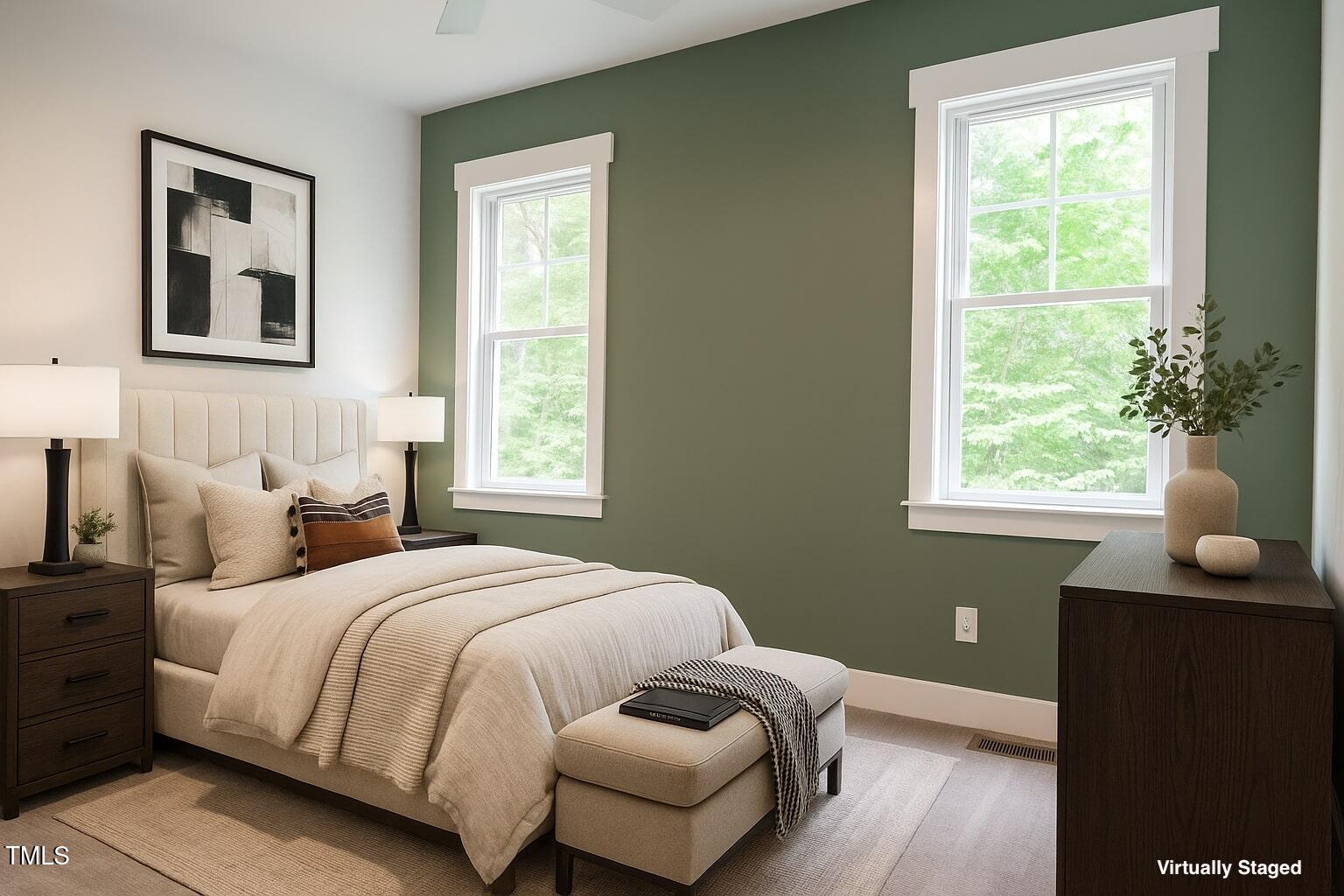 77 Running Deer Path Timberlake, NC 27583 - Photo 26 of 41 a bedroom with a bed and wooden floor