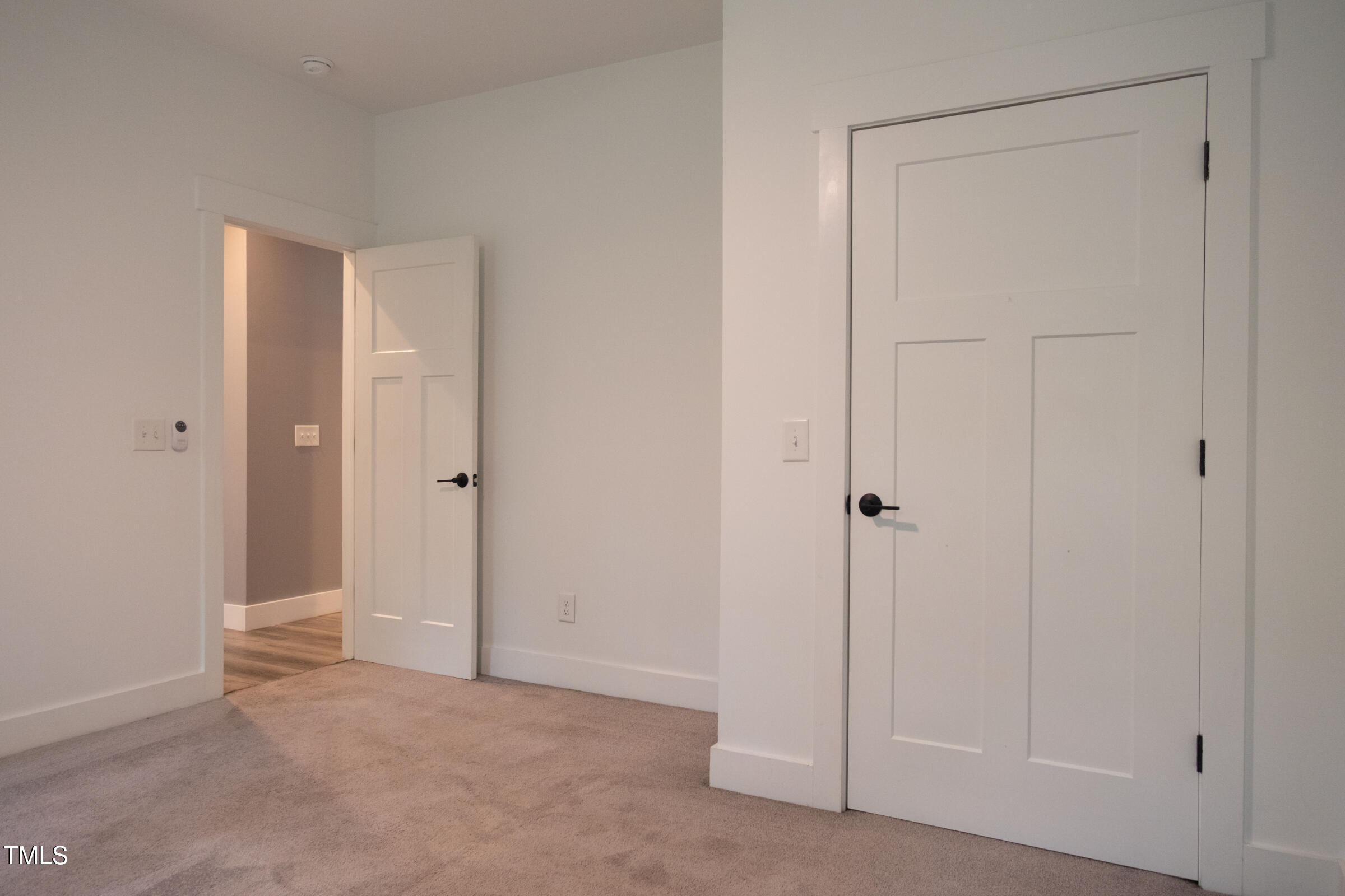 77 Running Deer Path Timberlake, NC 27583 - Photo 27 of 41 a view of an empty room with closet area