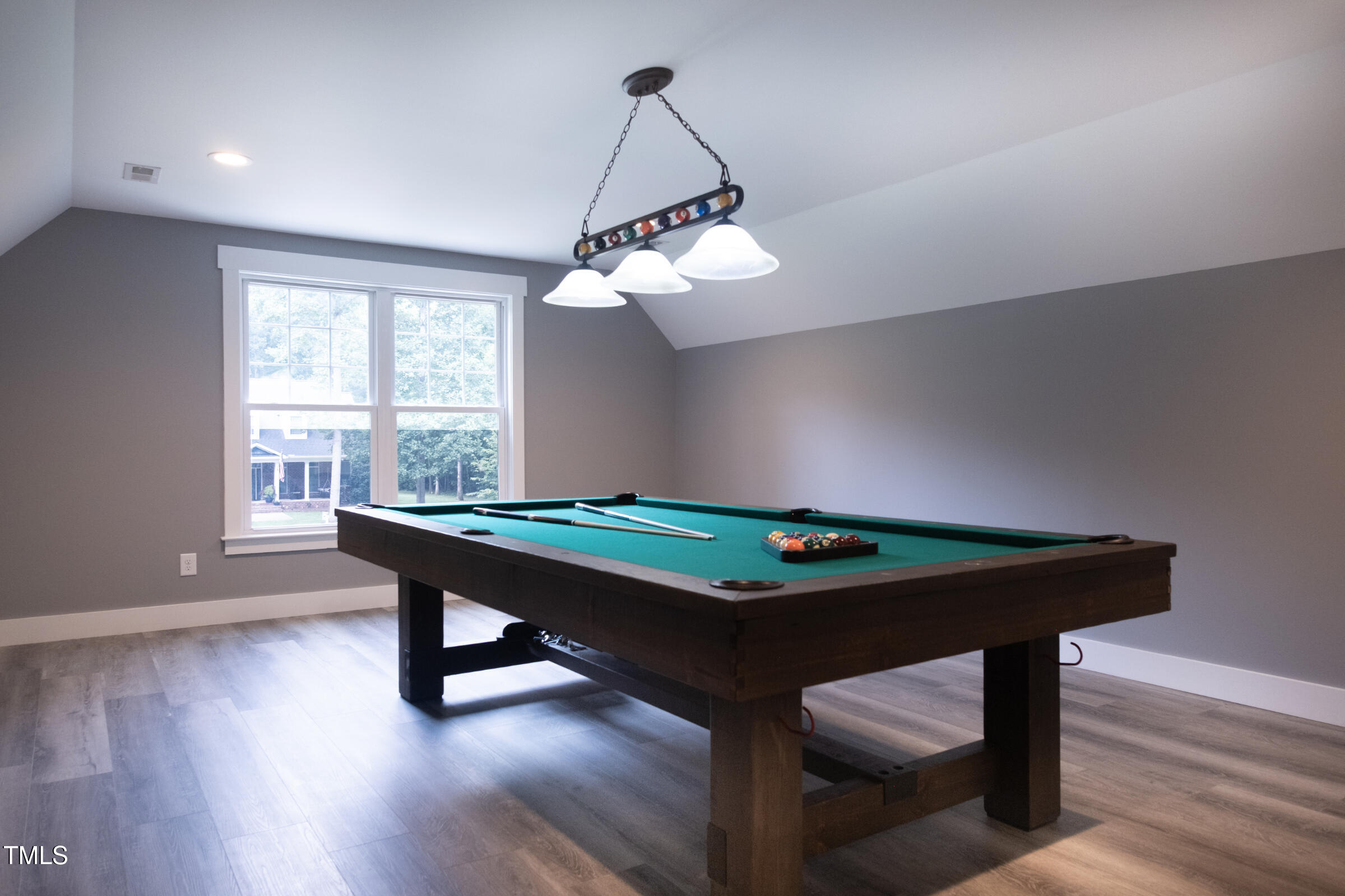 77 Running Deer Path Timberlake, NC 27583 - Photo 34 of 41 a room with wooden floor pool table and windows
