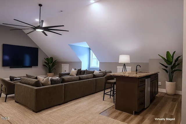 a view of a room with a kitchen