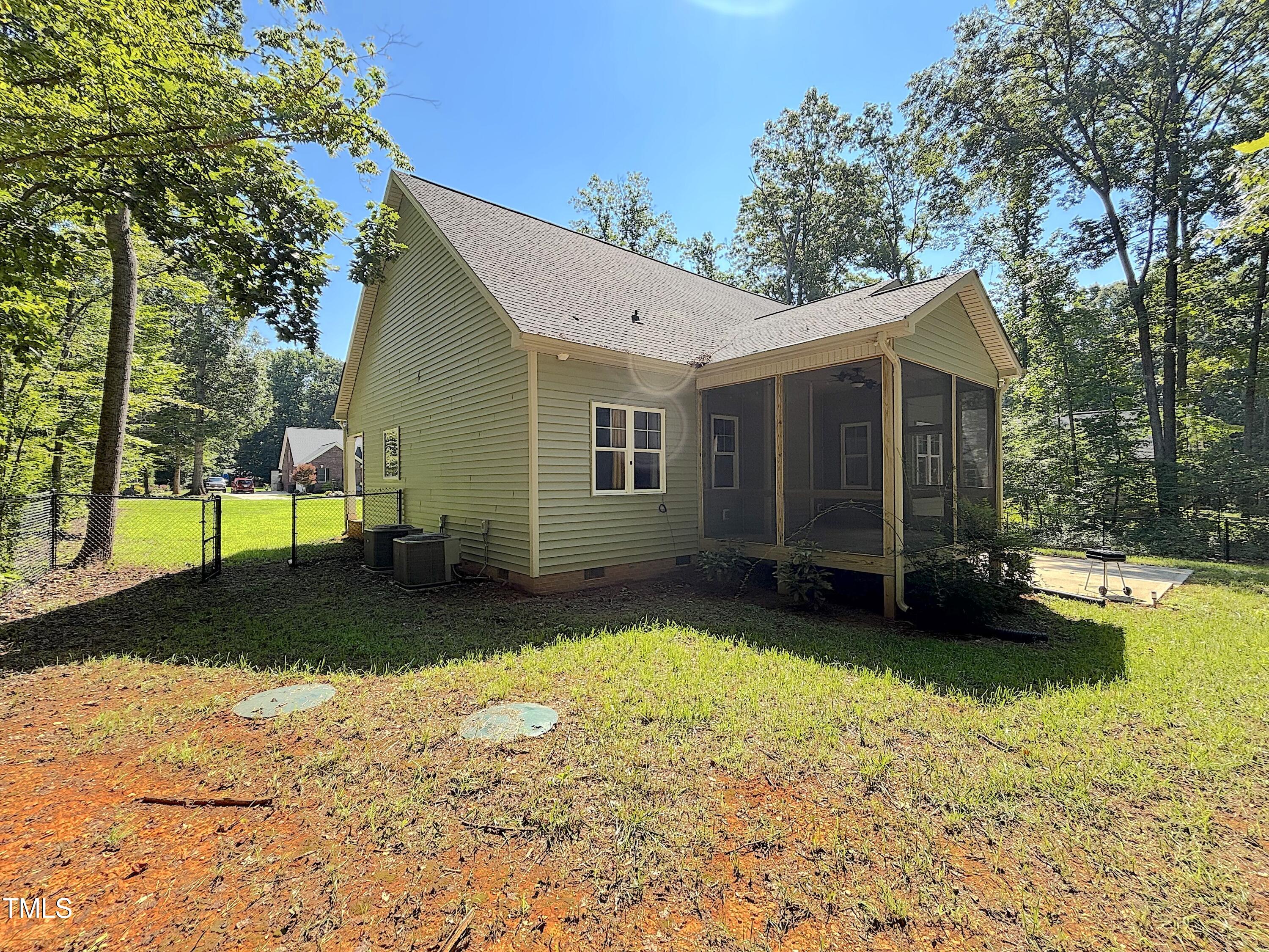 77 Running Deer Path Timberlake, NC 27583 - Photo 5 of 41 a view of a house with swimming pool and sitting area