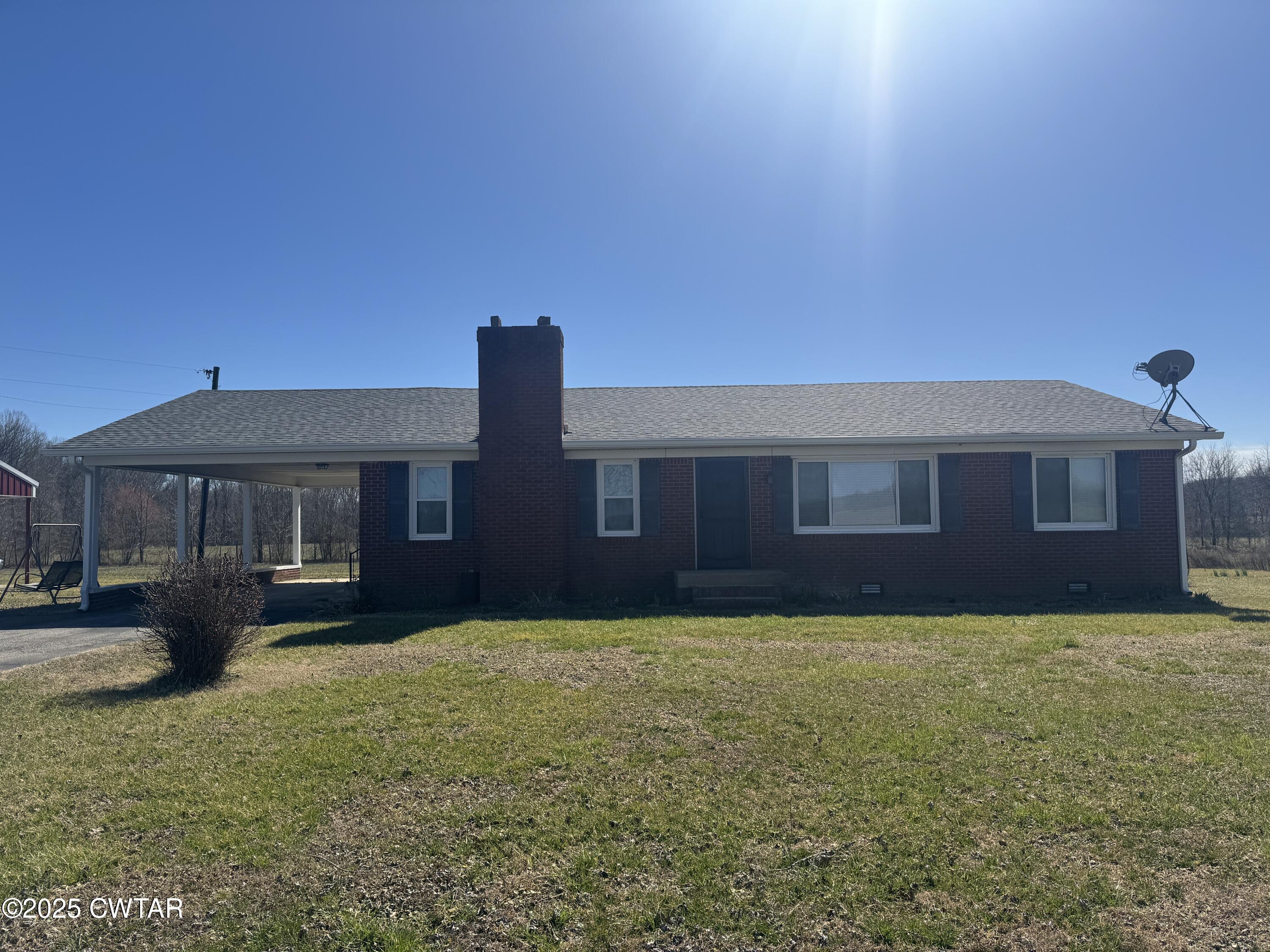 2685 Sunshine Road Henderson, TN 38340 - Photo 1 of 36 a view of a house with a yard