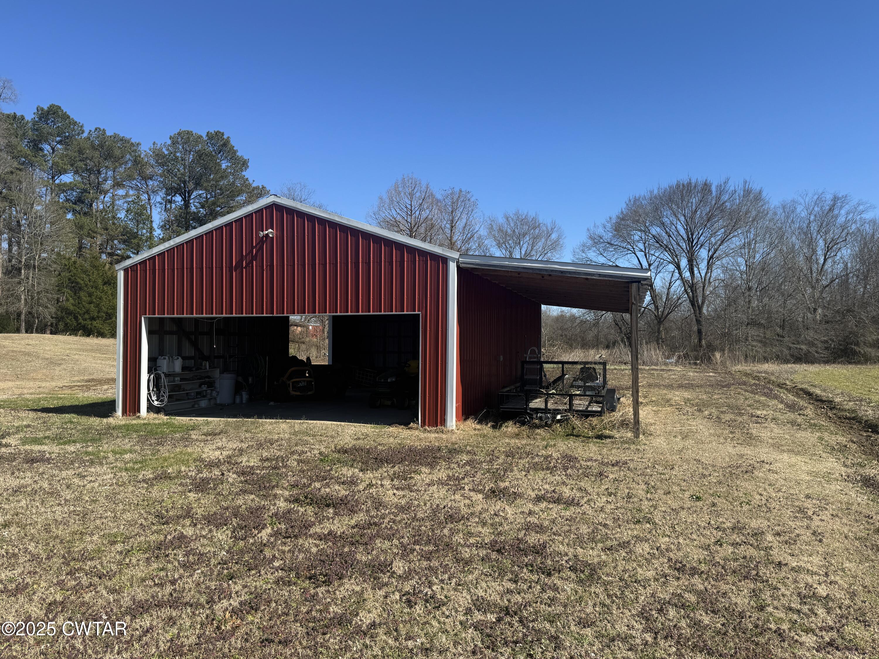 2685 Sunshine Road Henderson, TN 38340 - Photo 10 of 36 a view of a house with a yard