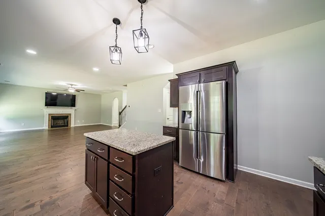 a bathroom with a shower and a toilet