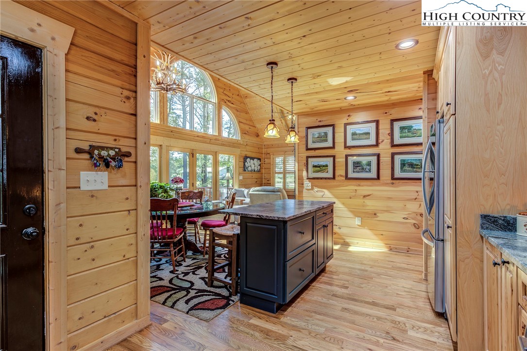 3460 South Center Church Road Thurmond, NC 28683 - Photo 24 of 50 a view of a living room kitchen and wooden floor