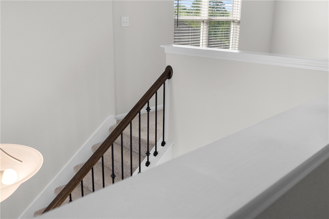 4702 Nopalitos Way Bryan, TX 77807 - Photo 22 of 27 a view of an entryway with wooden floor