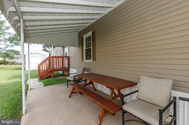 a building outdoor space with patio furniture