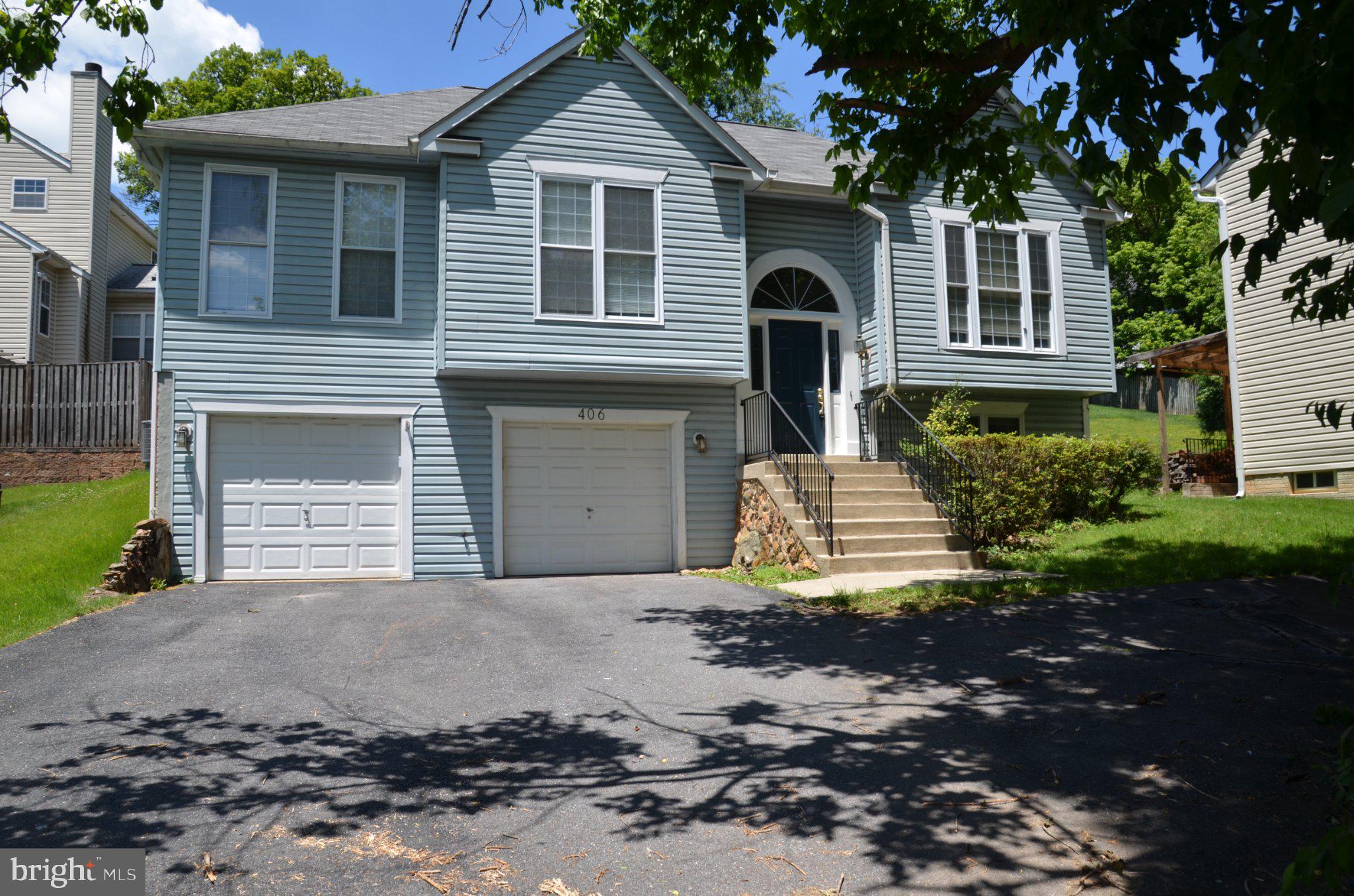 406 Longdraft Road Gaithersburg, MD 20878 - Photo 3 of 24 Charming blue home with inviting curb appeal.