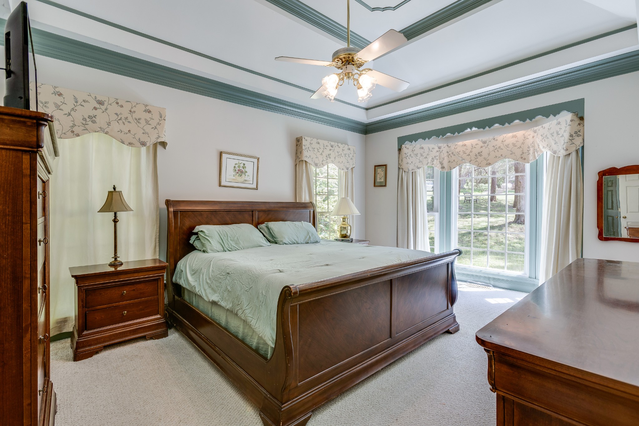 1111 Temple Ridge Court Nashville, TN 37221 - Photo 27 of 46 a spacious bedroom with a bed and a large window