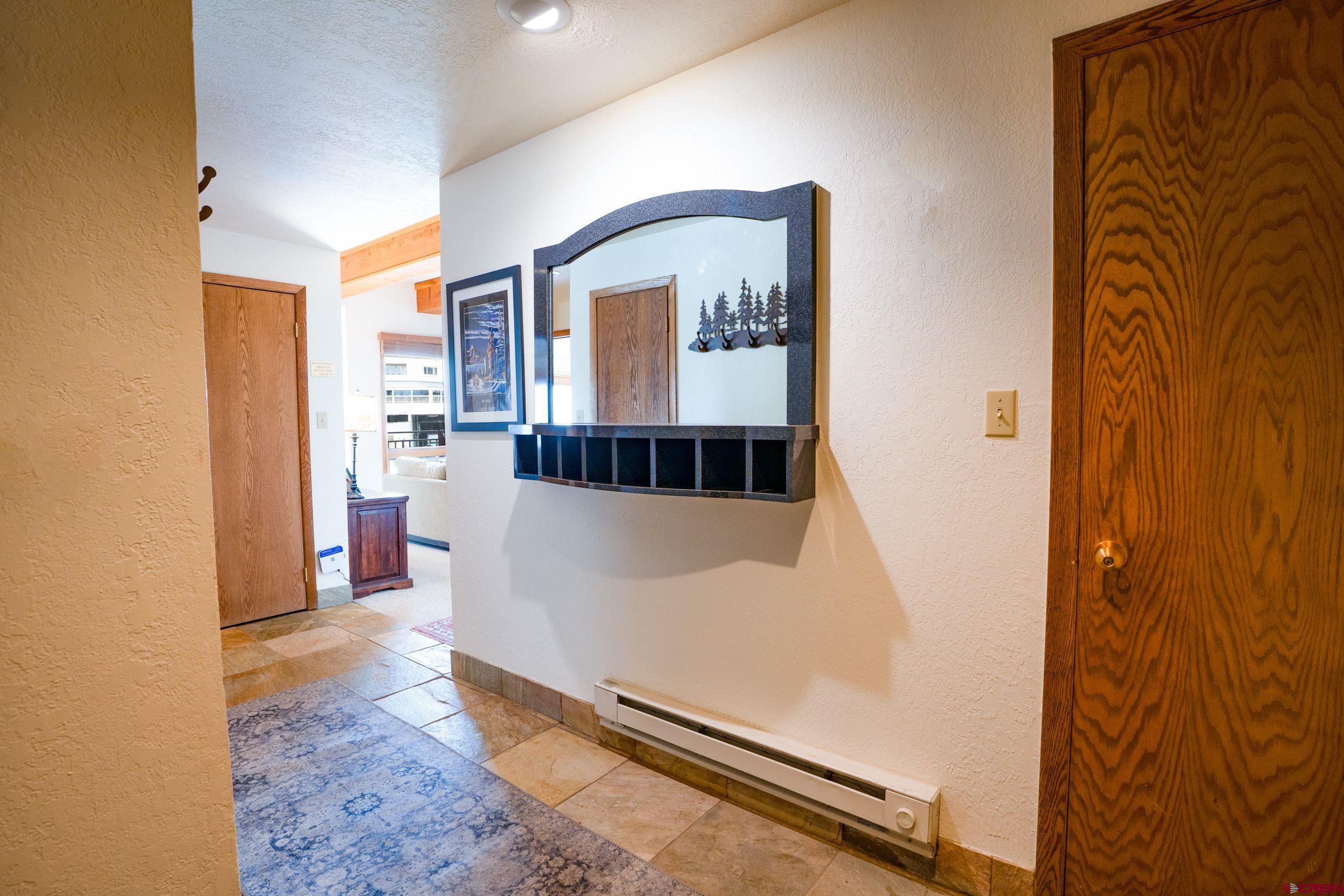 11 Snowmass Road, Unit 440 Crested Butte, CO 81225 - Photo 25 of 41 a view of a hallway with elevator