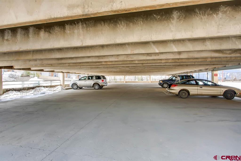 11 Snowmass Road, Unit 440 Crested Butte, CO 81225 - Photo 39 of 41 a view of car parked in parking