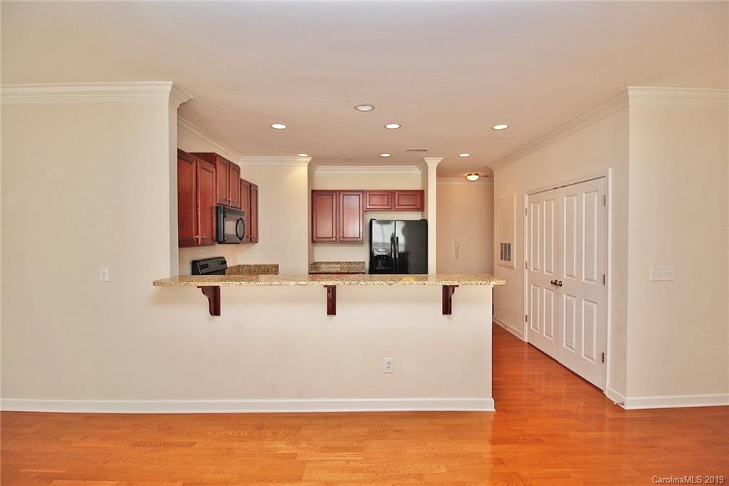 4154 Walker Road Charlotte, NC 28211 - Photo 13 of 37 a view of kitchen with stainless steel appliances kitchen island