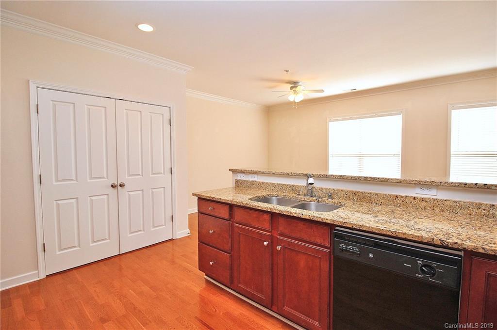 4154 Walker Road Charlotte, NC 28211 - Photo 18 of 37 a kitchen with a sink and a window
