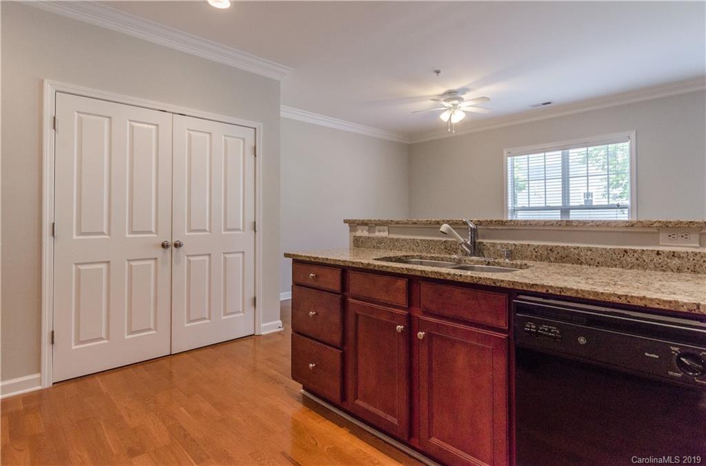 4154 Walker Road Charlotte, NC 28211 - Photo 21 of 37 a bathroom with a granite countertop sink and a mirror