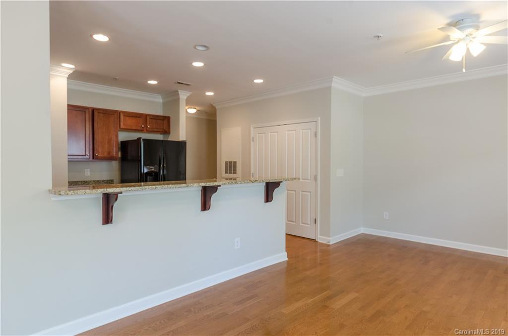4154 Walker Road Charlotte, NC 28211 - Photo 23 of 37 a view of kitchen with stainless steel appliances refrigerator and microwave