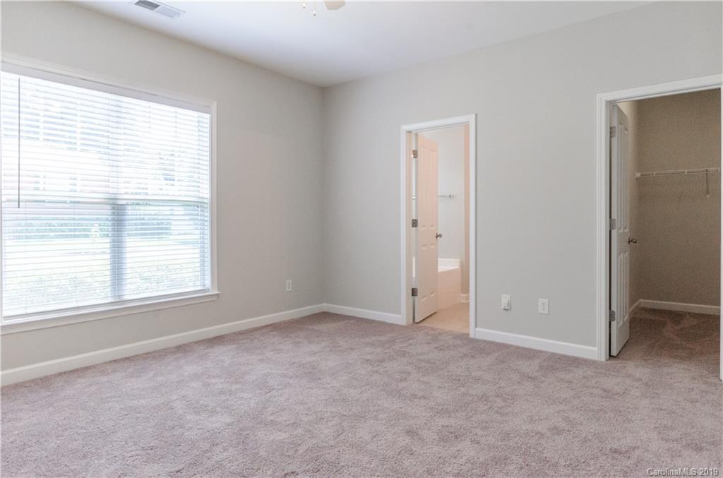 4154 Walker Road Charlotte, NC 28211 - Photo 31 of 37 a view of an empty room with a window