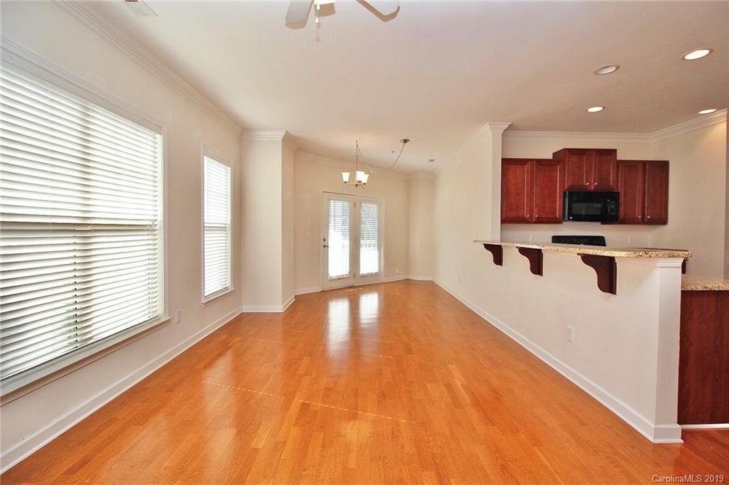 4154 Walker Road Charlotte, NC 28211 - Photo 7 of 37 a view of kitchen with furniture and flat screen tv