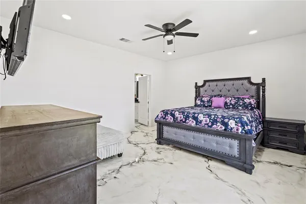 a living room with a couch and a flat screen tv