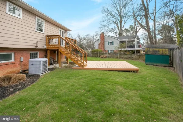 a view of a backyard with a garden and plants