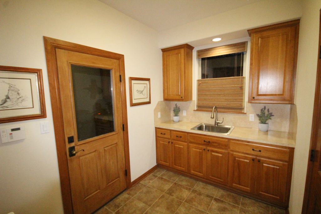 5255 Lookout Ridge Drive Marble Falls, TX 78654 - Photo 39 of 40 Sink basin cabinets and granite counters