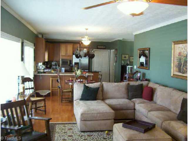 Other. View of LR from FP end showing breakfast area and kitchen. Lots of windows give great view of lake.