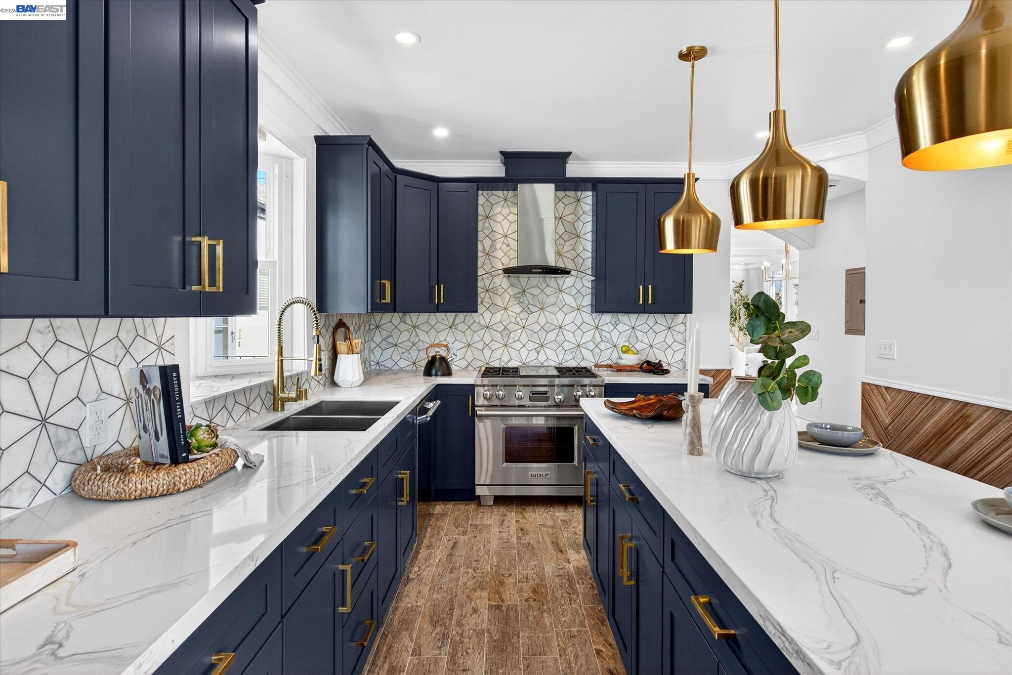 552 Haight Avenue Alameda, CA 94501 - Photo 14 of 43 a kitchen with kitchen island granite countertop a sink counter top space and cabinets