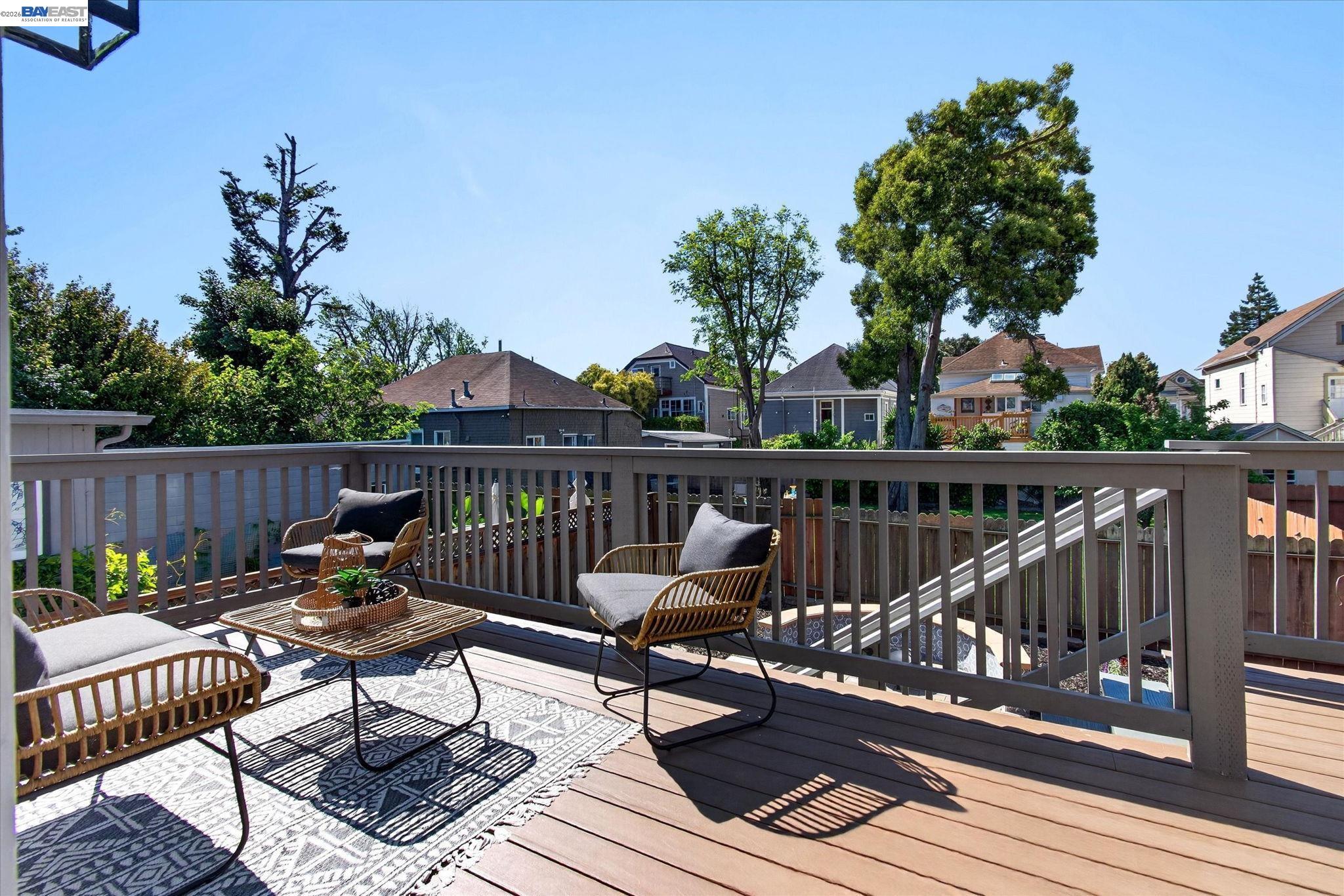 552 Haight Avenue Alameda, CA 94501 - Photo 17 of 43 a view of a roof deck with wooden floor and furniture