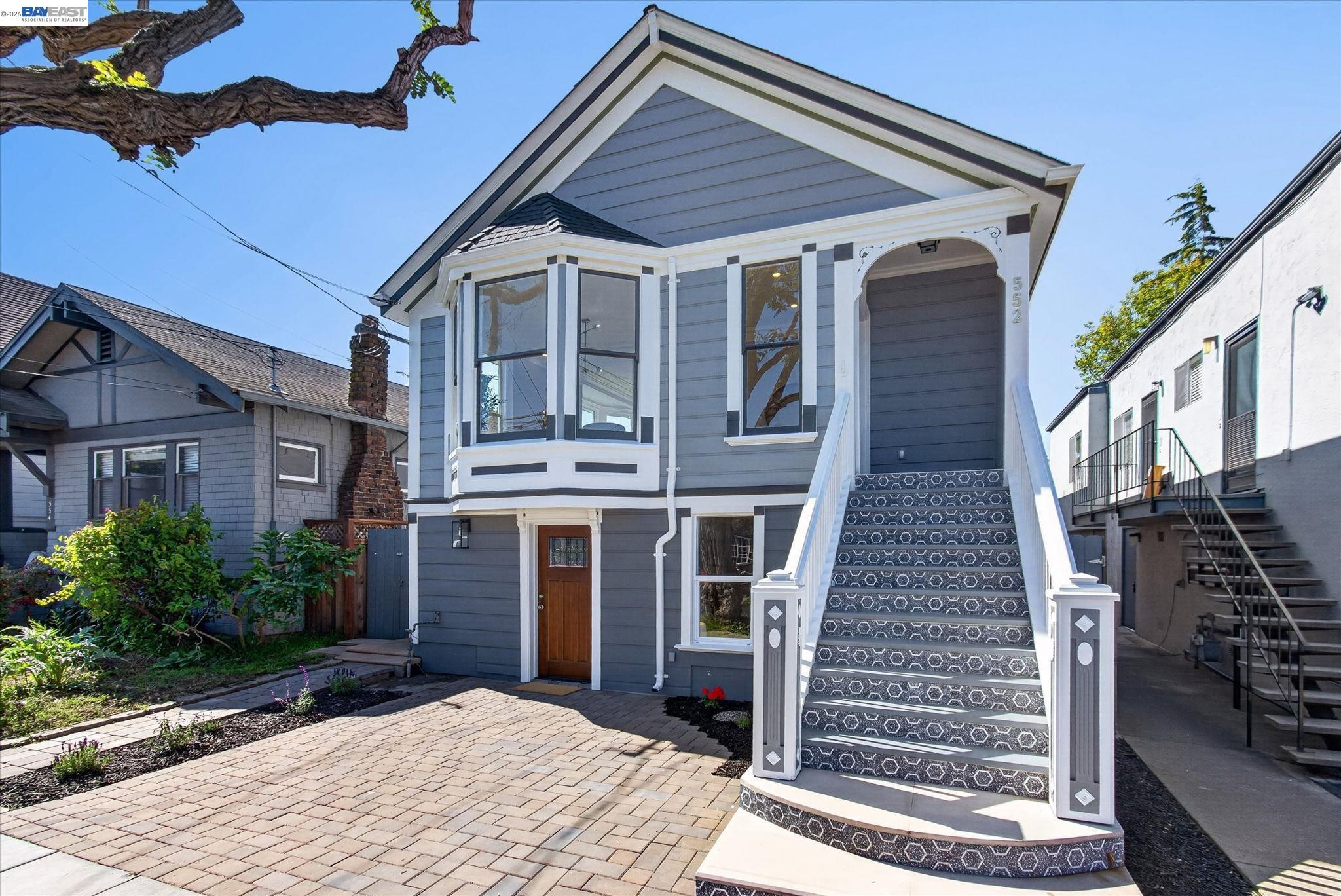 552 Haight Avenue Alameda, CA 94501 - Photo 2 of 43 a front view of a house with a yard