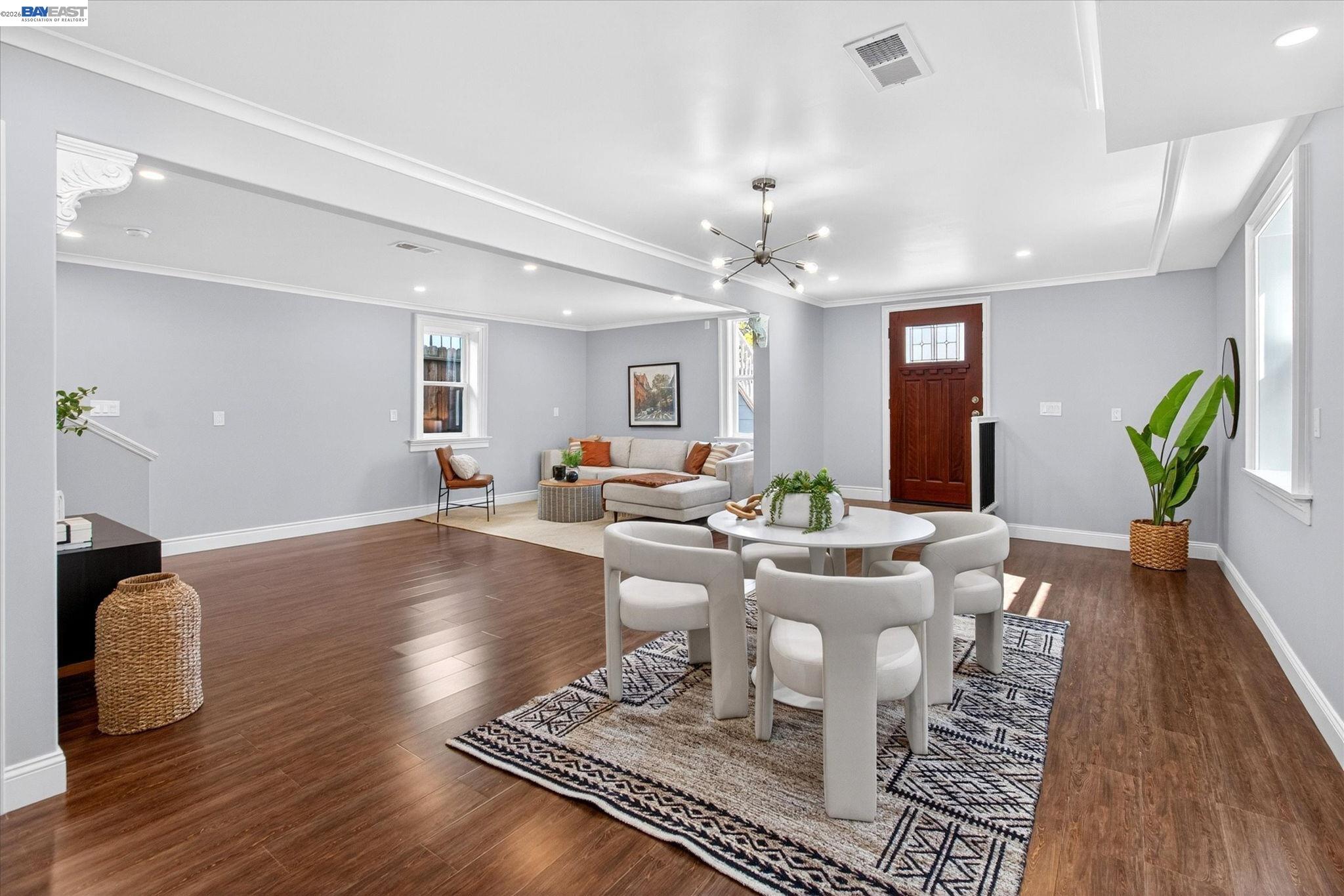 552 Haight Avenue Alameda, CA 94501 - Photo 29 of 43 a living room with furniture and wooden floor