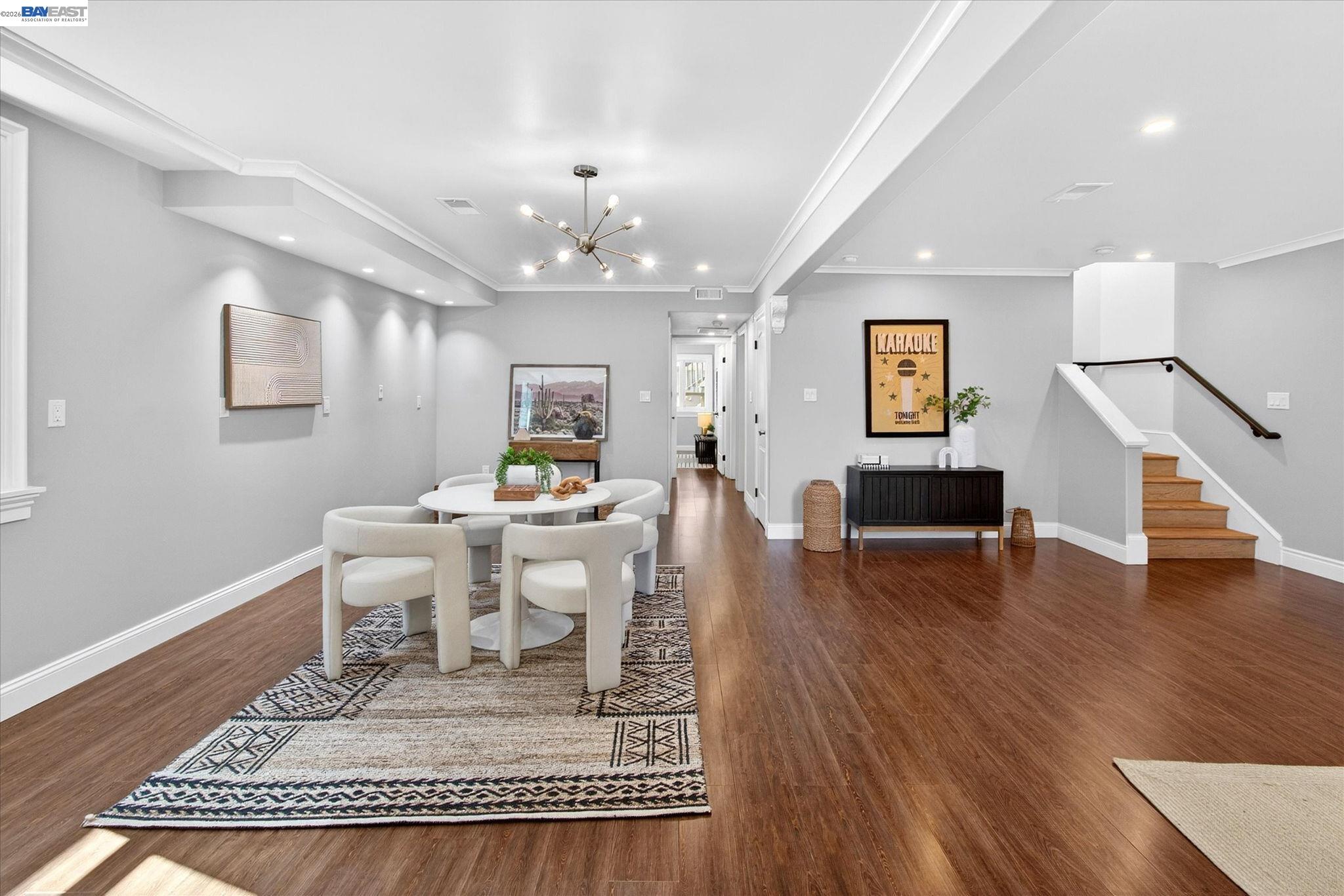 552 Haight Avenue Alameda, CA 94501 - Photo 32 of 43 a living room with furniture and a wooden floor