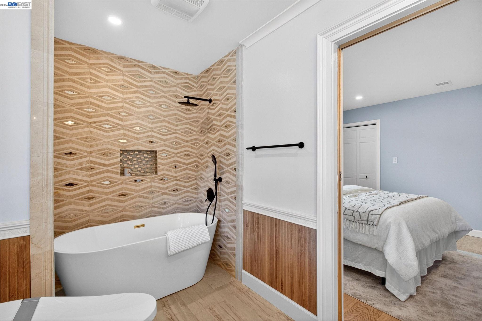 552 Haight Avenue Alameda, CA 94501 - Photo 36 of 43 a bathroom with a bathtub and a shower