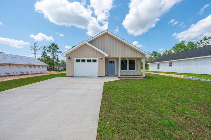 5428 Bayleaf Drive Crestview, FL 32539 - Photo 1 of 23 a front view of house with yard and green space