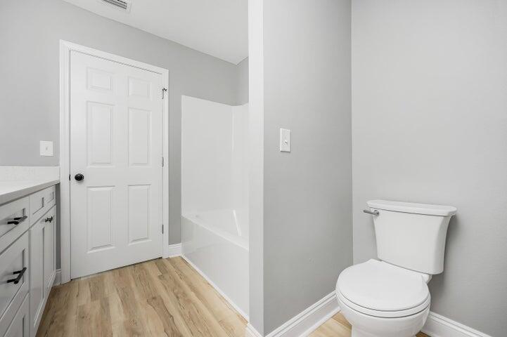 5428 Bayleaf Drive Crestview, FL 32539 - Photo 15 of 23 a bathroom with a toilet and a shower